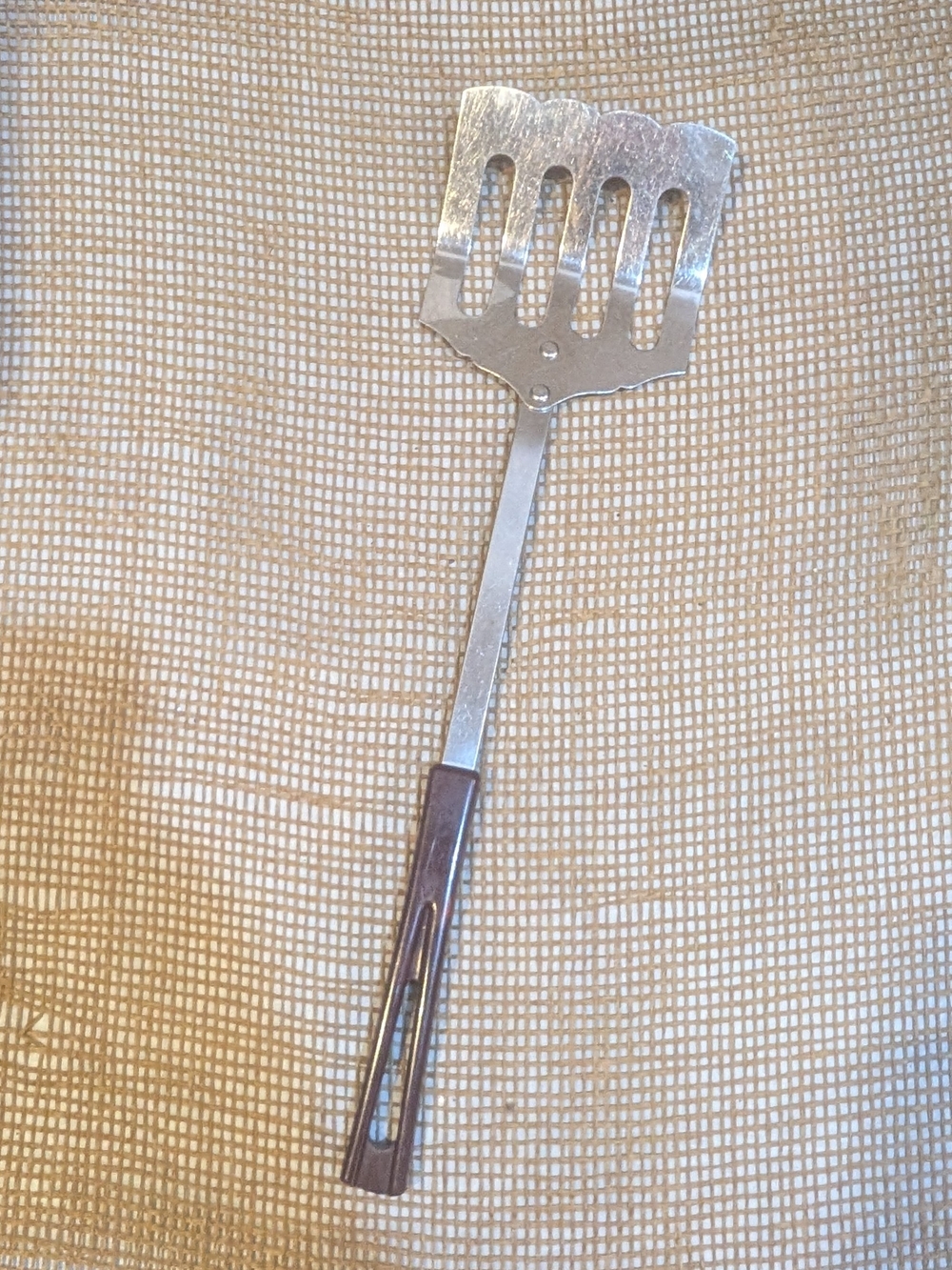 Vintage Stanhome Slotted Metal Turner with Marbled Brown Handle